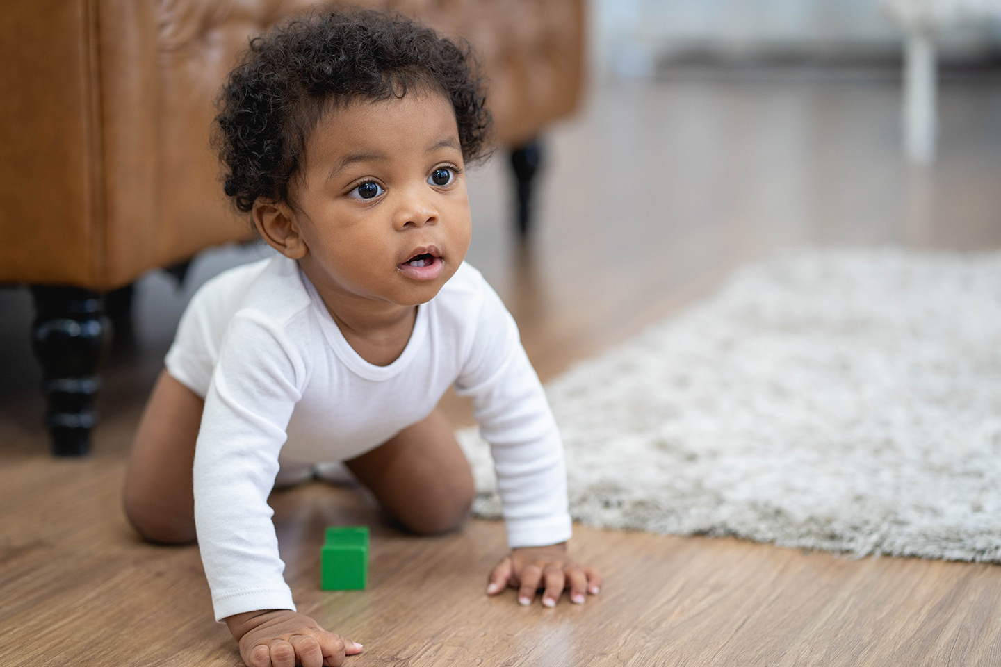 baby learning to crawl